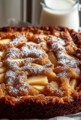 Delicious Apple Fritter Cake topped with glaze and fresh apple pieces