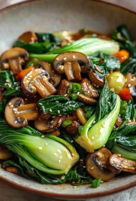 Bok Choy and Mushroom Stir-fry served in a bowl with colorful vegetables