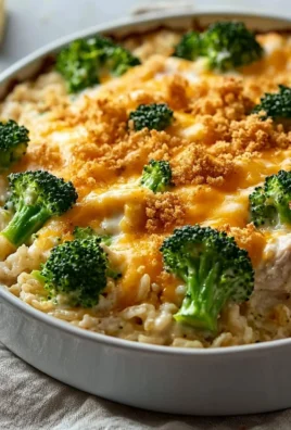 Delicious cheesy broccoli chicken casserole served in a baking dish