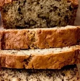 Freshly baked easy banana bread on a wooden table