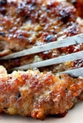 Homemade breakfast sausage patties sizzling in a skillet