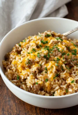 Cheesy ground beef and rice casserole in a baking dish
