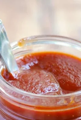 Homemade copycat Sweet Baby Ray's BBQ sauce served in a bowl