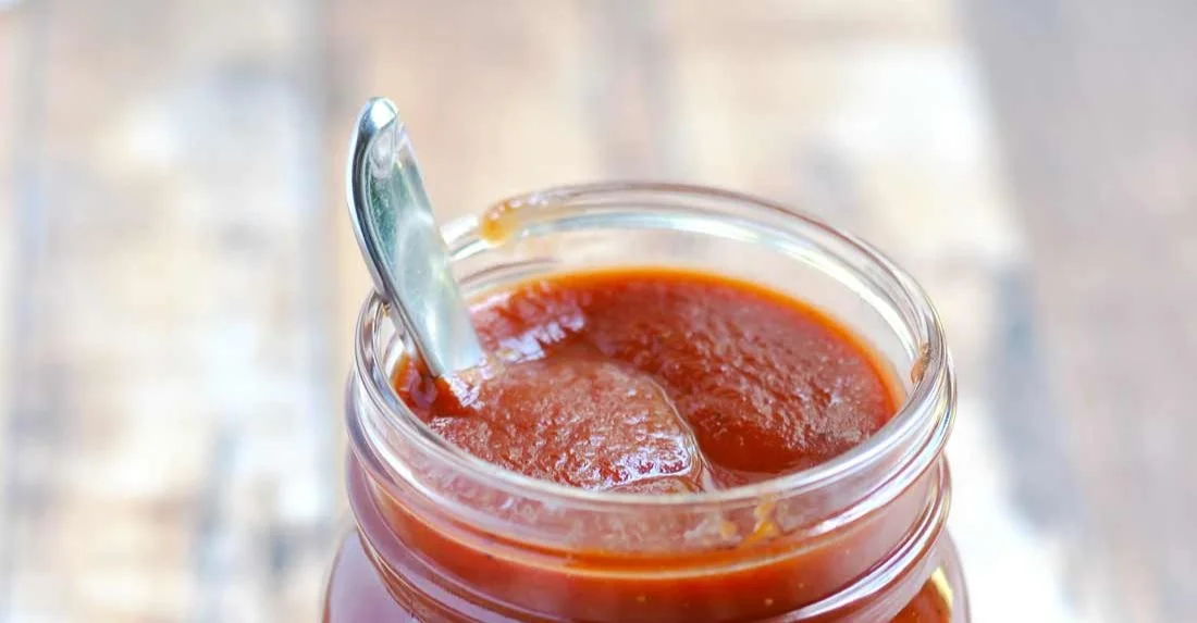 Homemade copycat Sweet Baby Ray's BBQ sauce served in a bowl