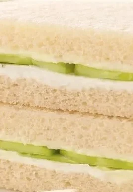 Delicious cucumber tea sandwiches arranged on a platter for afternoon tea