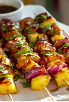 Grilled Hawaiian Chicken Kebabs with vibrant fruits and vegetables
