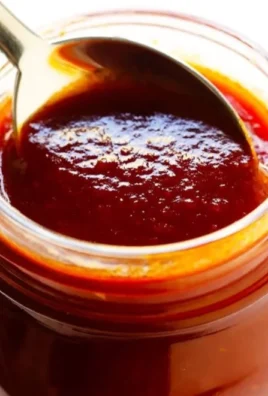 Jar of Kansas City-style homemade BBQ sauce with spices and ingredients