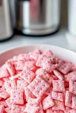 Delicious Quick Strawberry Shortcake Puppy Chow snack mixture in a bowl