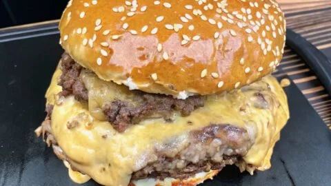Juicy smash burgers with creamy baconnaise on a plate