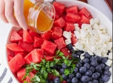 Delicious Watermelon Blueberry Feta Salad served in a bowl, showcasing vibrant colors.