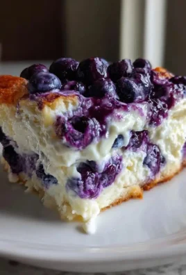 Delicious blueberry cottage cheese bake served in a bowl.