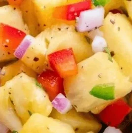 Bowl of easy Baja Fresh copycat pineapple salsa with fresh ingredients