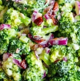 Delicious bowl of easy broccoli salad with fresh vegetables and dressing