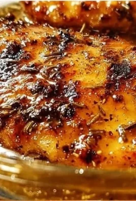 Grilled chicken marinated in a flavorful marinade for a delicious BBQ dish.