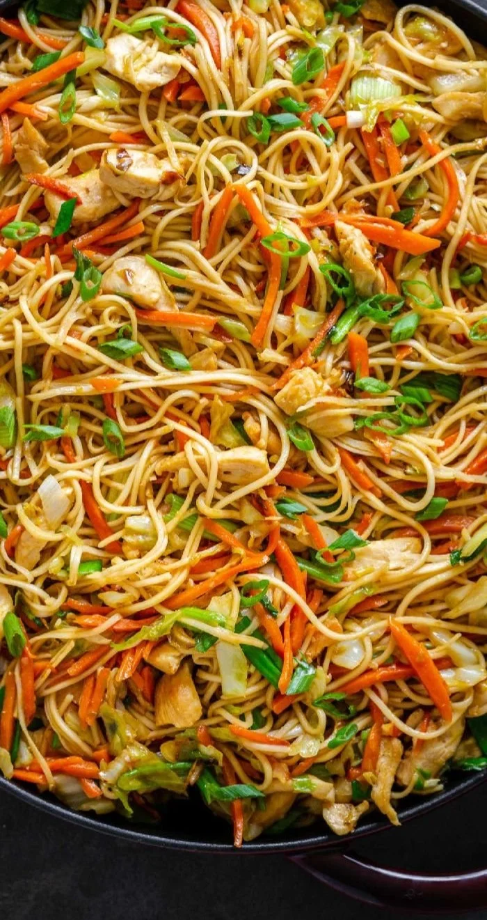 Delicious homemade Chow Mein served with fresh vegetables and noodles