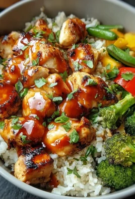 Delicious Hot Honey Chicken Bowl with honey chicken and fresh vegetables
