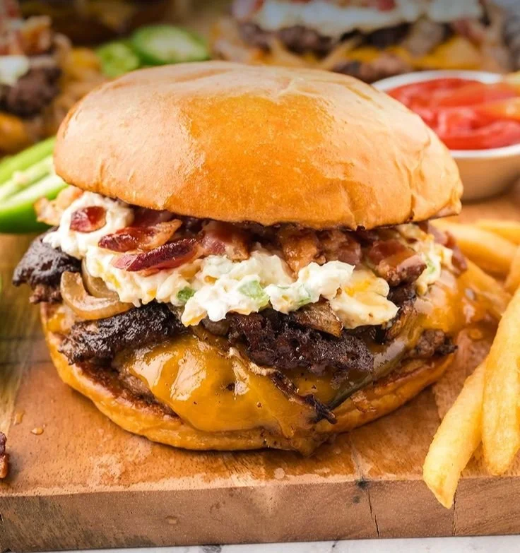 Delicious Jalapeño Popper Smash Burger topped with jalapeños and cheese