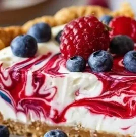 No-Bake 4th of July Swirl Pie with vibrant red, white, and blue layers