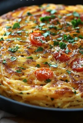 Delicious spaghetti frittata cooked with egg and pasta for a hearty meal