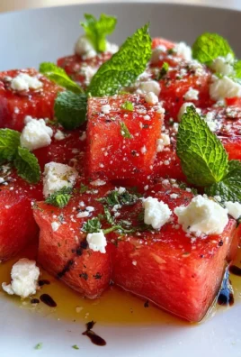 Colorful watermelon feta skewers arranged on a platter for summer snacks