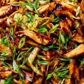 Delicious chicken chow mein with crispy pan-fried noodles and fresh vegetables.