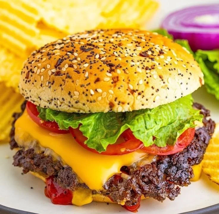 Delicious ultimate homemade smash burgers with juicy beef patties and toppings.