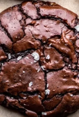 Decadent brownie cookies with fudgy centers and crisp edges.