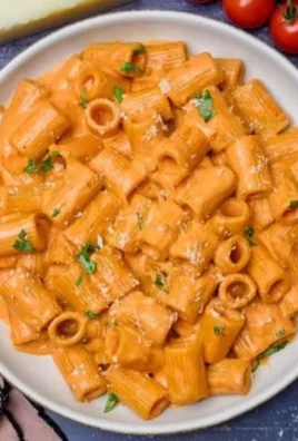 Delicious creamy tomato pasta sauce in a bowl ready to be served with pasta.