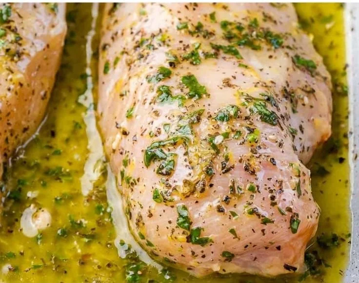Greek baked chicken breast topped with feta cheese and herbs