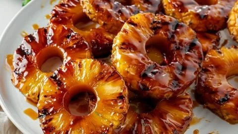Deliciously grilled pineapple slices on a plate