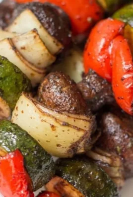 Healthy marinated grilled vegetable kebabs on a skewer