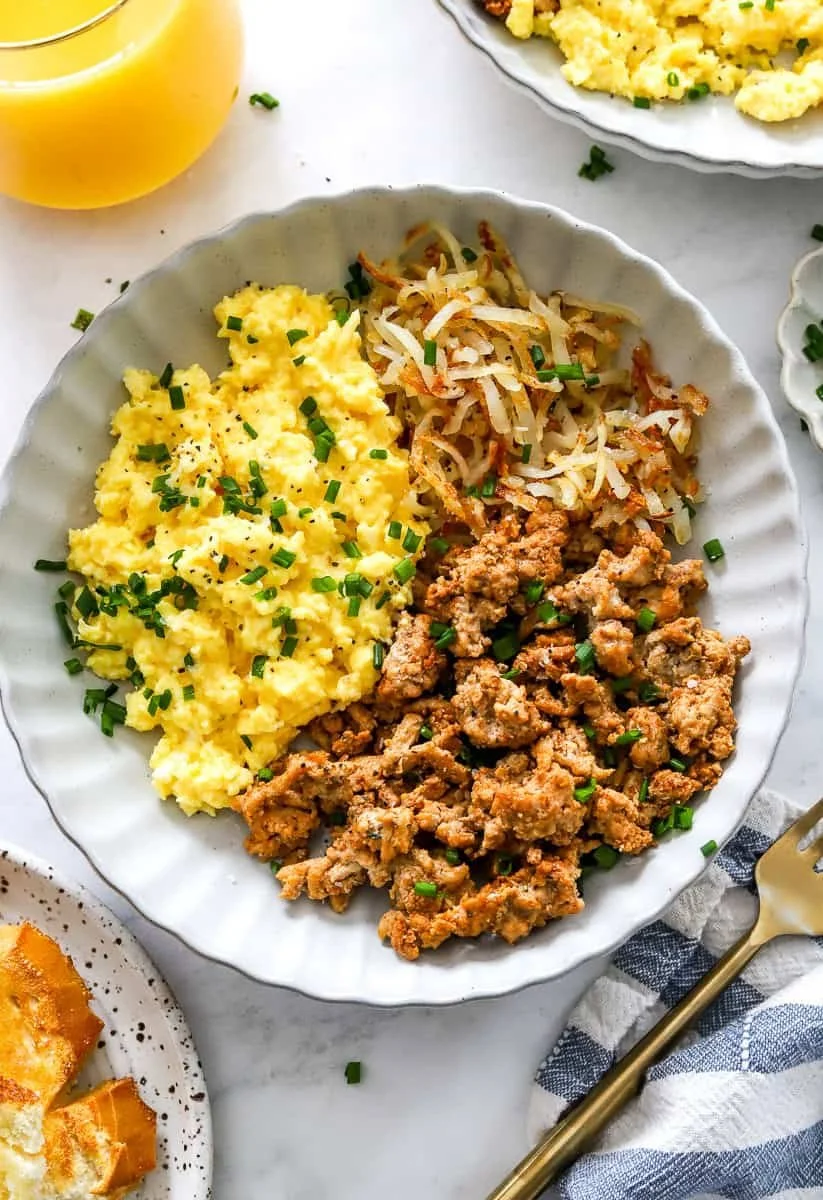 High Protein Breakfast Bowl with eggs, quinoa, and fresh vegetables