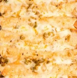 Low carb white chicken enchiladas topped with cheese and cilantro