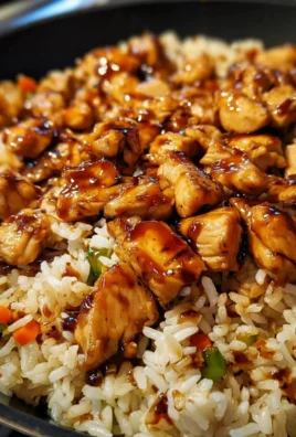 One-Pan Bold Honey BBQ Chicken Rice served on a plate with fresh herbs