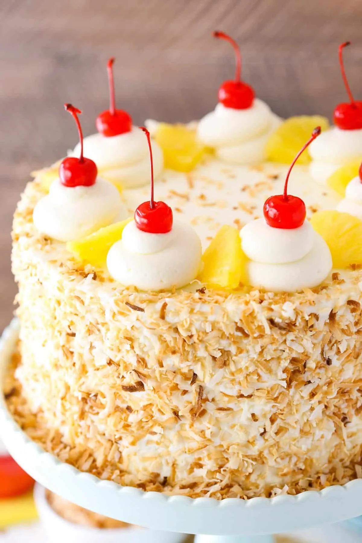 Delicious Pina Colada Layer Cake with coconut and pineapple layers