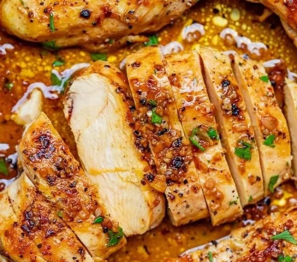 Skillet Garlic Butter Chicken served in a cast iron pan