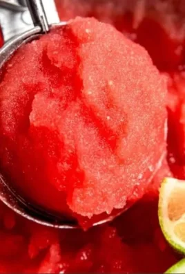 Delicious watermelon sorbet served in a bowl with mint leaves