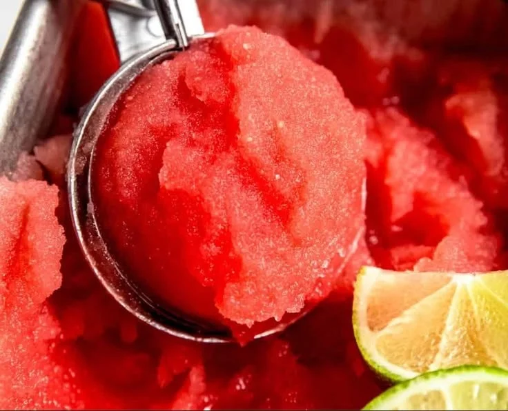 Delicious watermelon sorbet served in a bowl with mint leaves